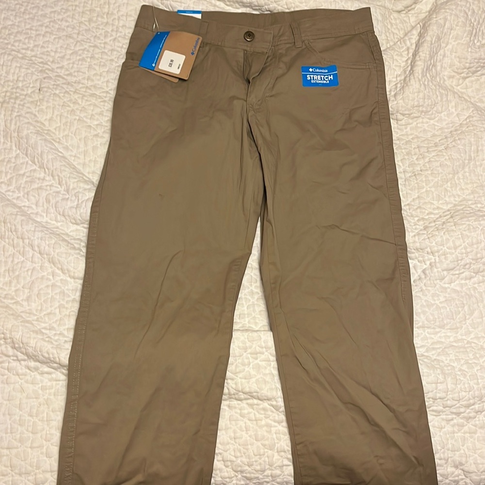 Never worn. Tag still included Columbia khaki pants. W32L30